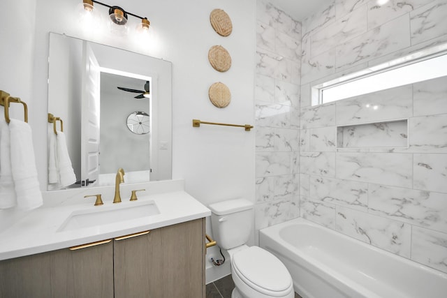 bathroom featuring shower / tub combination, vanity, and toilet