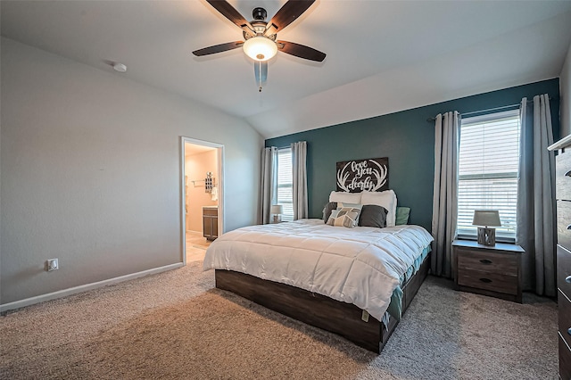 bedroom with carpet, multiple windows, baseboards, and vaulted ceiling