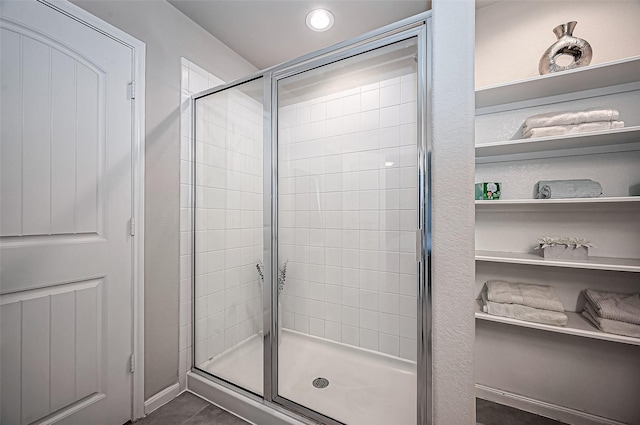 full bathroom with a shower stall