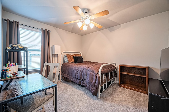 bedroom featuring carpet floors and a ceiling fan