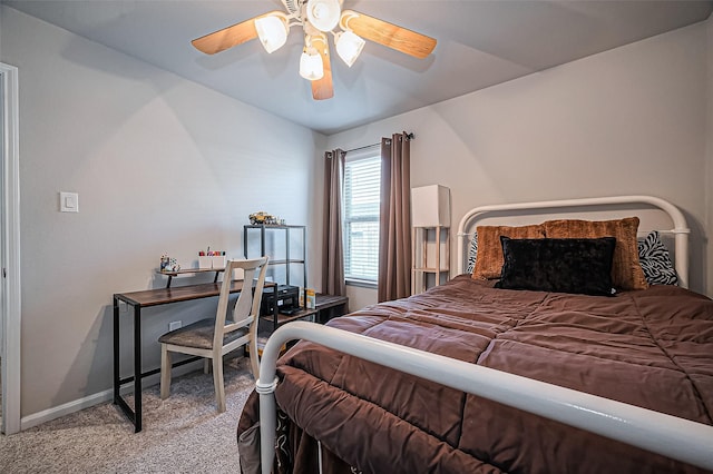 bedroom with carpet, baseboards, and a ceiling fan