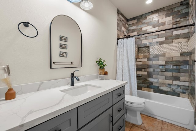 bathroom featuring shower / bathtub combination with curtain, tile patterned flooring, vanity, and toilet