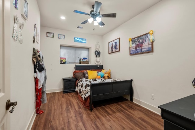 bedroom featuring ceiling fan, recessed lighting, wood finished floors, visible vents, and baseboards