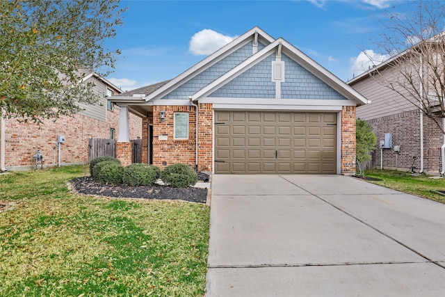 view of front of home with a garage, brick siding, driveway, and a front lawn