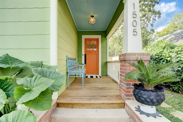 property entrance with covered porch