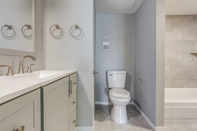 full bathroom featuring vanity, toilet, and baseboards