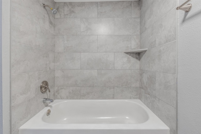 bathroom featuring shower / washtub combination