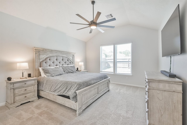 bedroom featuring lofted ceiling, light colored carpet, visible vents, ceiling fan, and baseboards