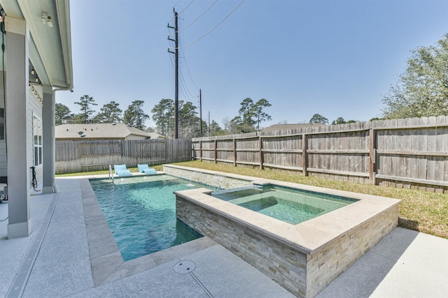 view of pool featuring a fenced in pool, a fenced backyard, and an in ground hot tub