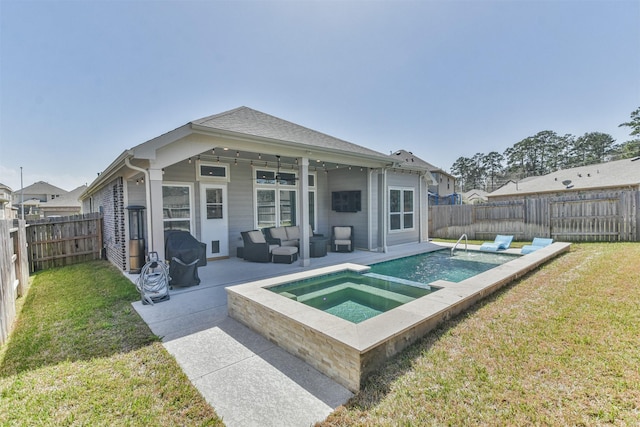 rear view of property featuring a patio area, a fenced backyard, a lawn, and an in ground hot tub