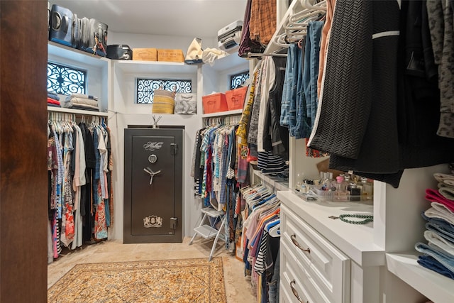 spacious closet with tile patterned flooring