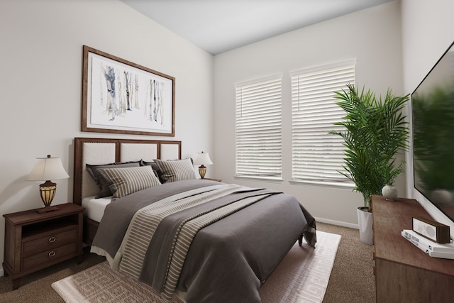 carpeted bedroom with baseboards