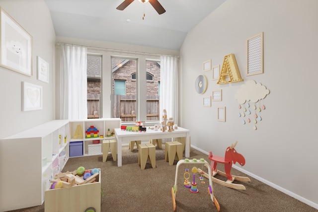 rec room featuring a ceiling fan, baseboards, vaulted ceiling, and carpet flooring