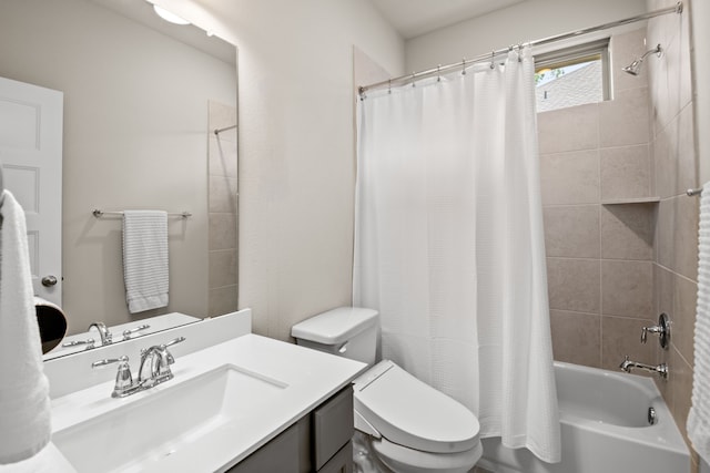 bathroom featuring vanity, toilet, and shower / bathtub combination with curtain