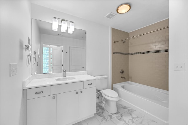 bathroom featuring marble finish floor, shower / bath combination, visible vents, toilet, and vanity