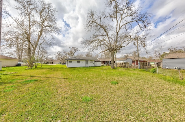 view of yard featuring fence