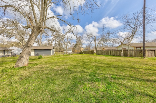 view of yard with fence