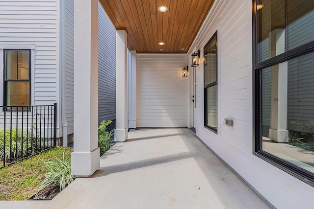 view of exterior entry featuring a porch