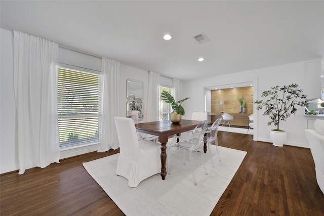 dining space with recessed lighting, visible vents, baseboards, and dark wood-style floors