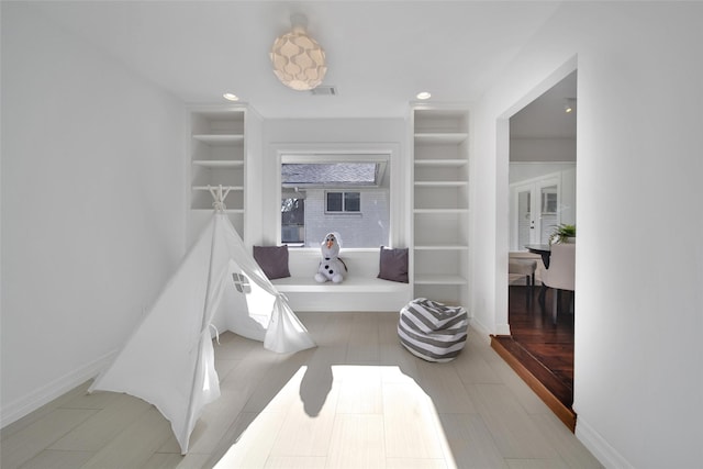 bathroom with built in features, recessed lighting, visible vents, and baseboards