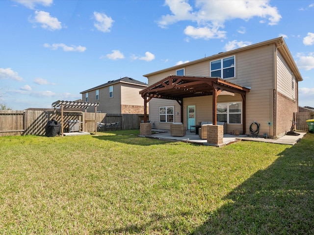 rear view of property featuring a fenced backyard, a lawn, a pergola, and a patio