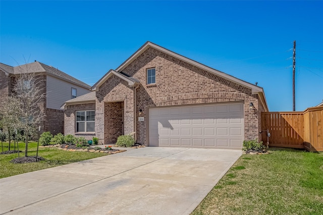 view of front of property featuring brick siding and a front yard