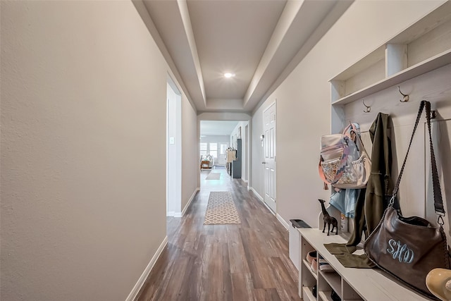 mudroom with baseboards and wood finished floors