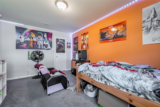 carpeted bedroom with baseboards and visible vents