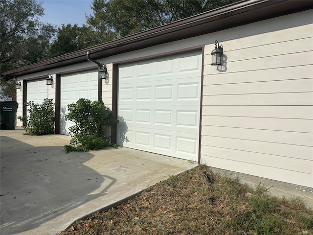 garage with driveway