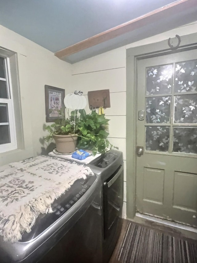 clothes washing area with laundry area and washing machine and clothes dryer