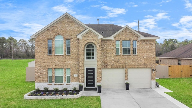 view of front of house featuring a garage, brick siding, fence, driveway, and a front lawn