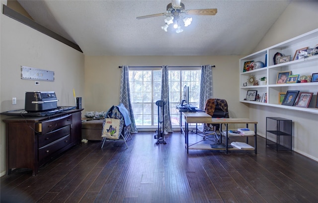 office area featuring lofted ceiling, a textured ceiling, a ceiling fan, and dark wood-type flooring