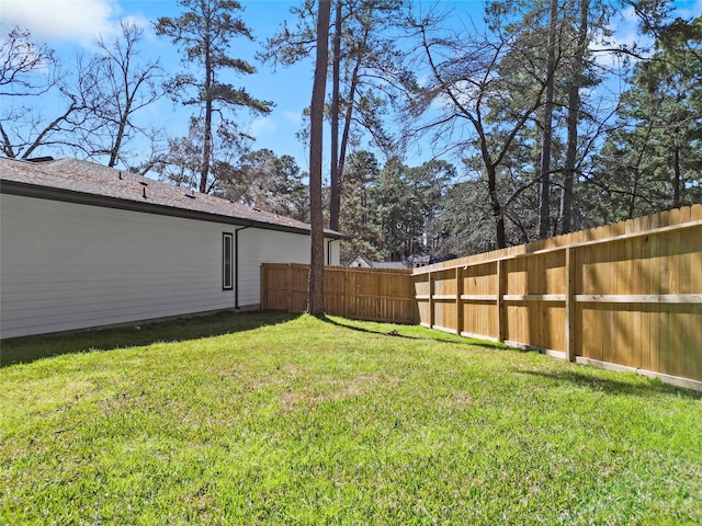 view of yard featuring fence