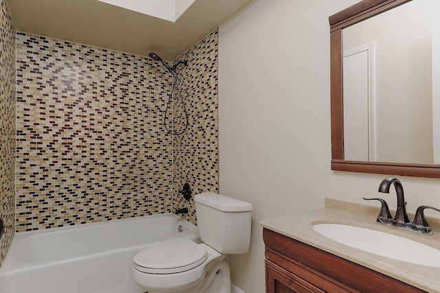 bathroom featuring shower / washtub combination, vanity, and toilet