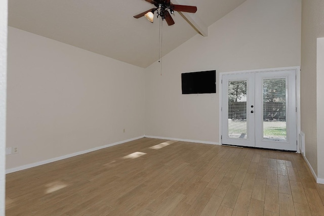 spare room with light wood-style flooring, baseboards, a ceiling fan, and french doors