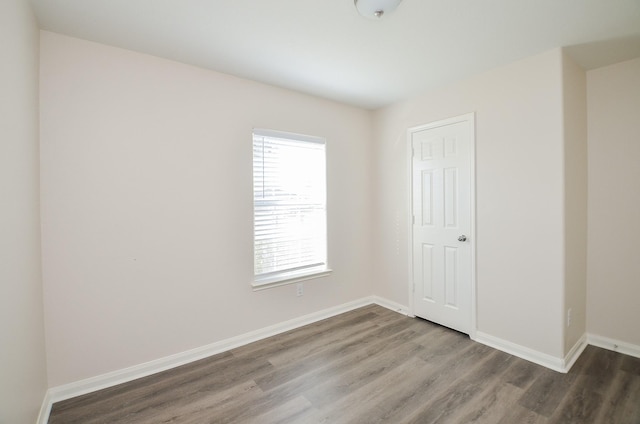 26810 Blacktail Ct, Hockley, TX 77447 - unfurnished room featuring wood finished floors and baseboards