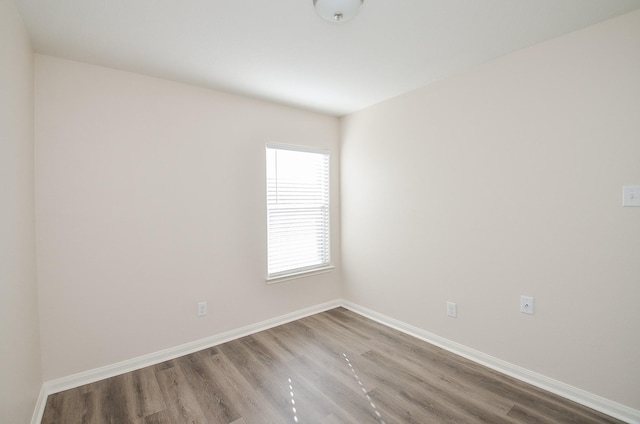 26810 Blacktail Ct, Hockley, TX 77447 - unfurnished room featuring wood finished floors and baseboards