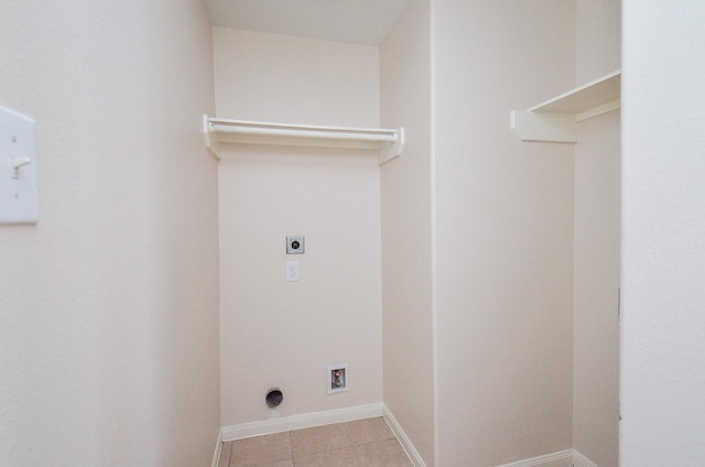 26810 Blacktail Ct, Hockley, TX 77447 - laundry room with baseboards, washer hookup, laundry area, light tile patterned flooring, and hookup for an electric dryer
