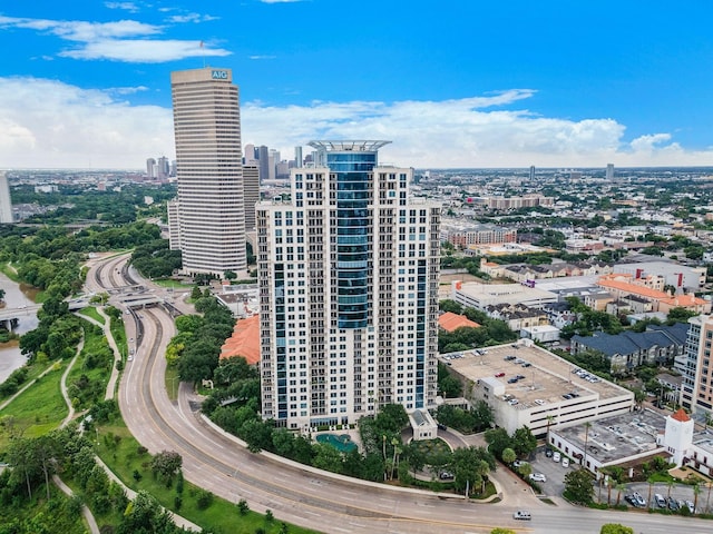 birds eye view of property with a view of city