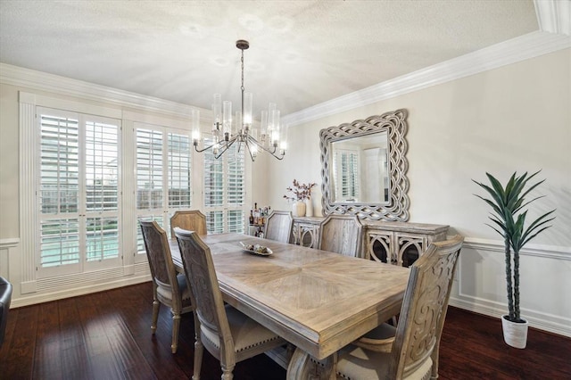 dining space with a wainscoted wall, ornamental molding, hardwood / wood-style floors, and a decorative wall