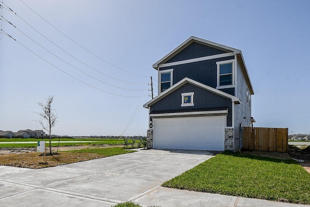 view of front of house featuring an attached garage, fence, and concrete driveway