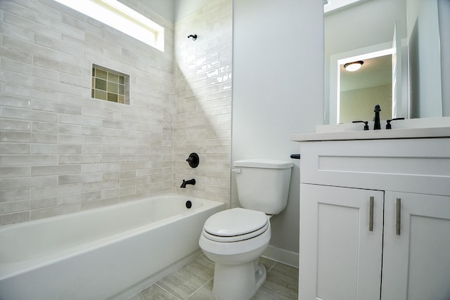 bathroom with shower / washtub combination, baseboards, vanity, and toilet