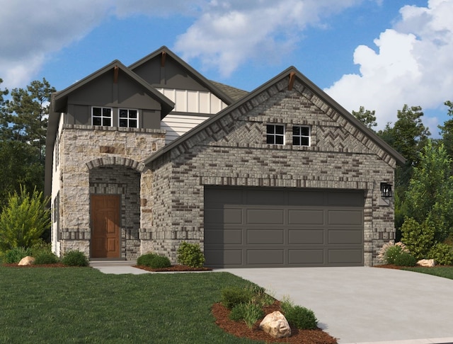 19126 Hazel Firs Ln, Magnolia, TX 77355 - view of front of home with driveway, stone siding, a garage, and a front lawn