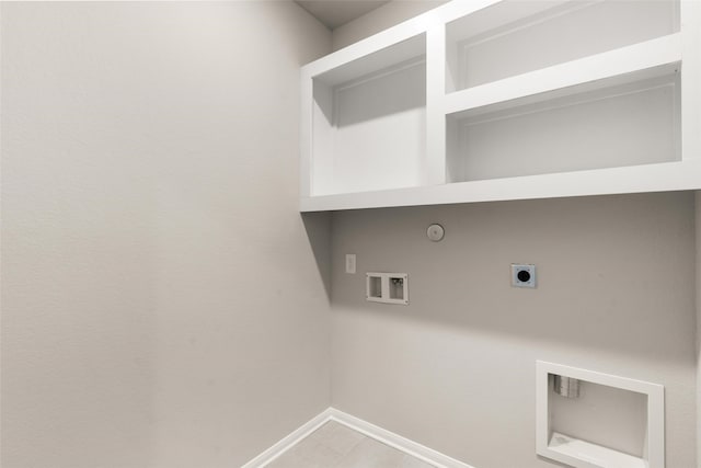 19126 Hazel Firs Ln, Magnolia, TX 77355 - washroom with electric dryer hookup, hookup for a gas dryer, washer hookup, and baseboards
