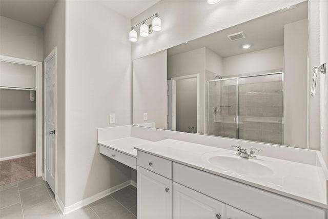 19126 Hazel Firs Ln, Magnolia, TX 77355 - full bathroom with a stall shower, tile patterned floors, vanity, and baseboards