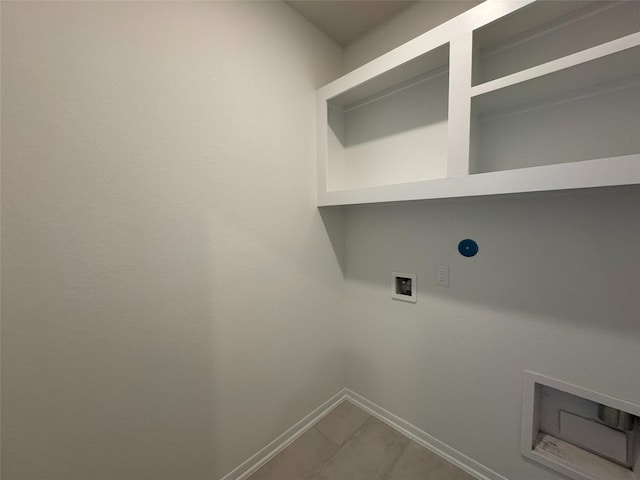 19126 Hazel Firs Ln, Magnolia, TX 77355 - laundry area featuring washer hookup, baseboards, hookup for an electric dryer, and tile patterned floors