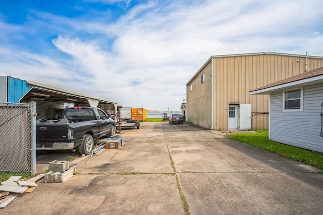 view of vehicle parking featuring concrete driveway