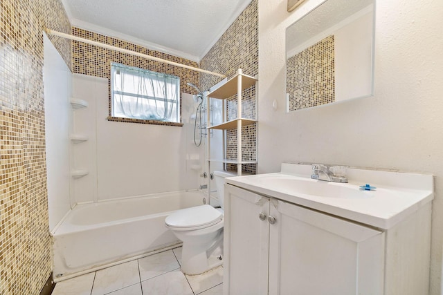3230 Virginia St, La Marque, TX 77568 - full bathroom with a textured ceiling, tile patterned flooring, toilet, vanity, and  shower combination