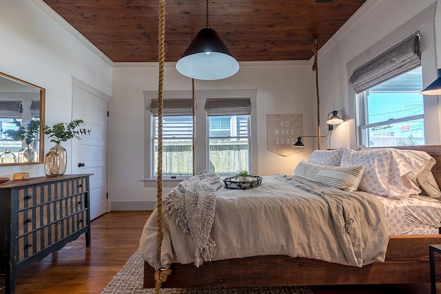 bedroom featuring ornamental molding, multiple windows, wood finished floors, and wood ceiling