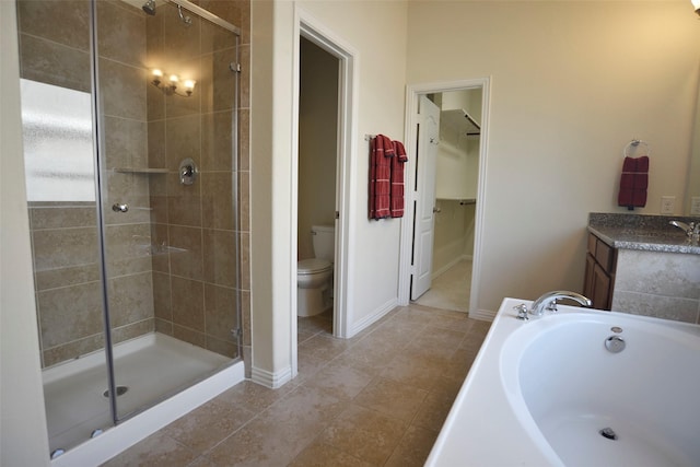 full bath featuring a stall shower, a spacious closet, toilet, and a bath